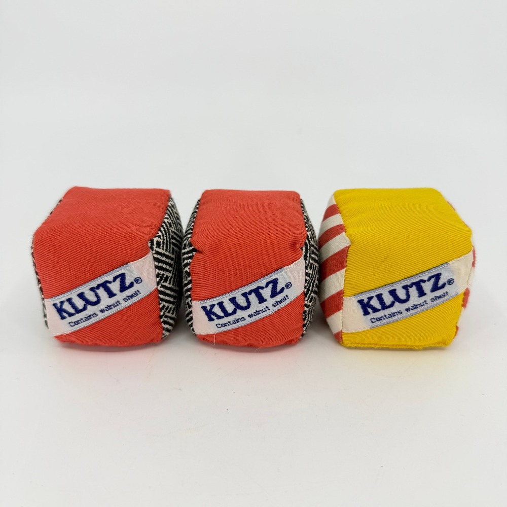 Klutz Juggling Cubes Bean Bags Set of 3 Red Yellow Walnut Shell Filled Skill Toy